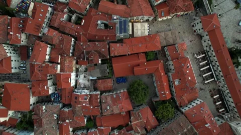A breathtaking aerial view showcasing the charming rooftops of a historic town Stock Footage 320746714