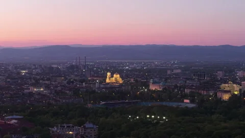 A breathtaking aerial view of Sofia, Bulgaria at sunset, featuring the National Stock Footage 308930416