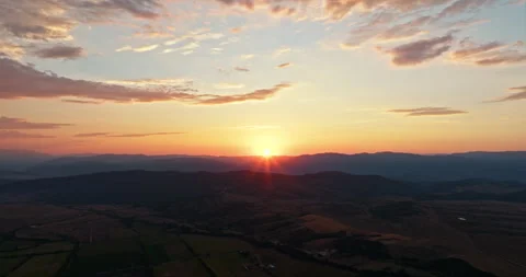 Breathtaking aerial view of sunset over endless Stock Footage 303301374