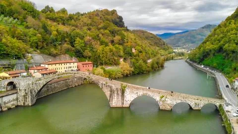 Breathtaking aerial view of Tuscanys Devils Bridge amidst lush greenery and.. Stock Photos