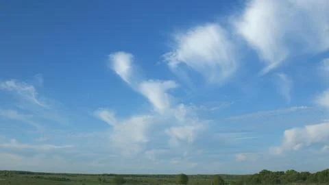 Breathtaking and Beautiful Cloud Patterns Grace a Clear and Bright Blue Sky Abov Photos