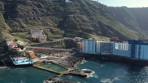 Breathtaking bird eye flight hotel complex on island Stock Footage 101963053