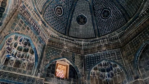 Breathtaking blue mosaic interior dome of Amir Zade mausoleum Stock Footage 336679356
