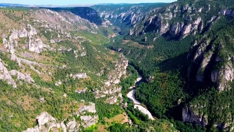 Breathtaking Canyon wit river flowing through valley Stock Footage 316616107