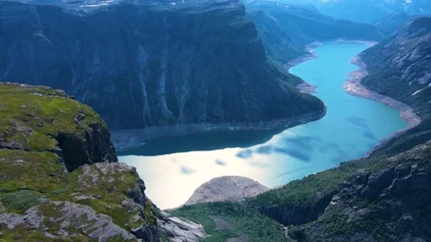 Breathtaking Cliffs and Blue Waters: A Fjord Drone Adventure Stock Footage 282395797