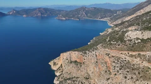 Breathtaking coastal cliffs and winding roads along Turkey shoreline 動画素材 315370731