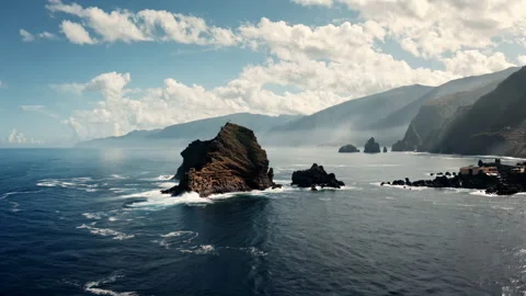 Breathtaking coastal scene featuring rugged cliffs and rock. Stock Footage 297398048