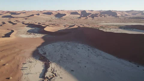 A breathtaking desert landscape with a flowing river and stunning horizon. Stock Footage 264020074