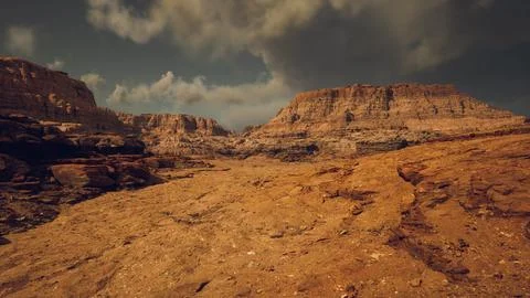 Breathtaking desert landscape with rugged cliffs under cloudy sky Stock Illustration