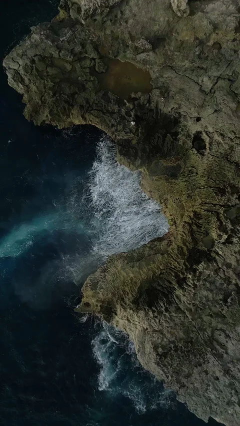 Breathtaking Drone Shot Dramatic Nusa Penida Coastline Waves 4K Stock Footage 339095875