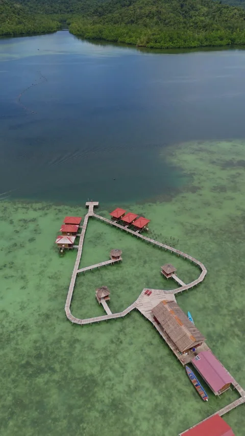 Breathtaking Drone Shot Heart Shaped Water Villas Misool Indonesia 4K Stock-Footage 336502574