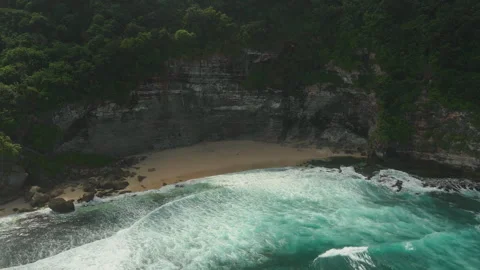 Breathtaking Drone Shot Hidden Bay Cliffs Uluwatu Ocean Waves 4K Video stock 340920825