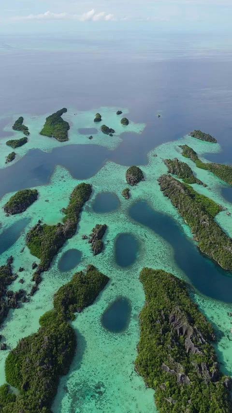 Breathtaking Drone Shot Limestone Cliffs Misool Indonesia 4K 動画素材 336640104