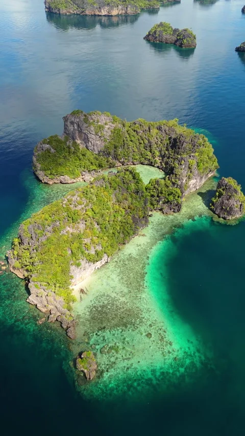 Breathtaking Drone Shot Limestone Cliffs Misool Indonesia 4K 動画素材 336746434