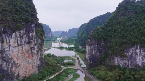 Breathtaking Drone Shot of Limestone Karsts in Tam Coc, Ninh Binh Stock Footage 281616869