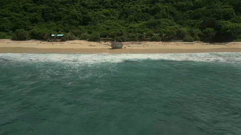 Breathtaking Drone Shot Shipwreck Beach Nunggalan Ocean Waves 4K Stock Footage 339584722