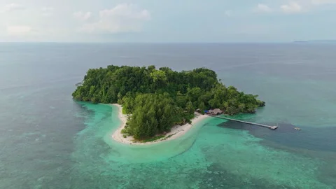 Breathtaking Drone Shot Tiny Beach and Pier Panun Island Indonesia 4K 스톡 동영상 337831284