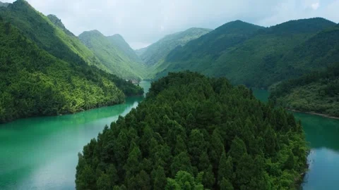 Breathtaking Drone Shots of Emerald Valleys and Cascading Waterfalls Stock Footage 304312740