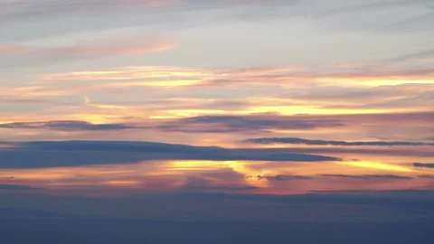 Breathtaking Flight Above the Clouds During a Stunning Sunset in 4k slow mo.. Stock Footage 265424182
