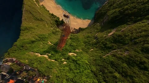 Breathtaking FPV Drone Flight Along Kelingking Cliffs Landscape Stock-Footage 337033792