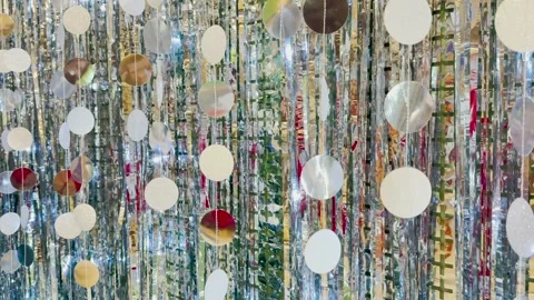 Breathtaking hanging party elements, soft silver curtain glow, spectacular Stock Footage 313906618