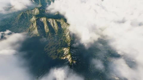 Breathtaking high aerial drone view of green mountain peaks through clouds Stock Footage 338229923