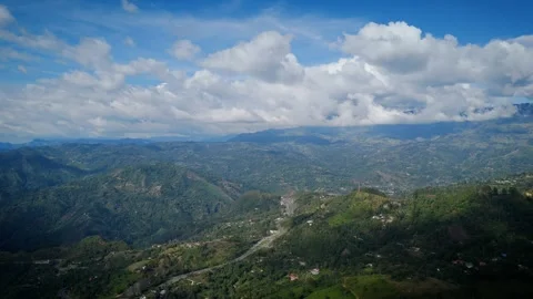 Breathtaking High-Altitude View of Mountainous Landscape and Winding Road Stock Footage 316793776