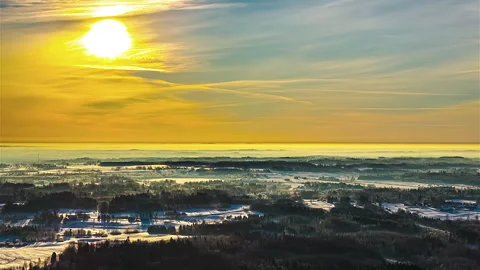 Breathtaking Hyperlapse of Snowy Winter Landscape at Sunset 스톡 동영상 330996838