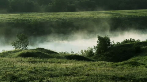 Breathtaking landscape. Calm stream of the river. The steam over the river. Stock Footage 61852048