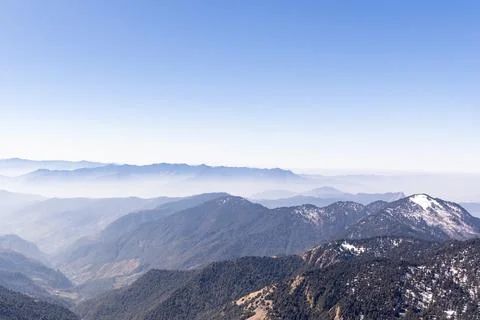 Breathtaking mist covered mountain range at morning Foto stock