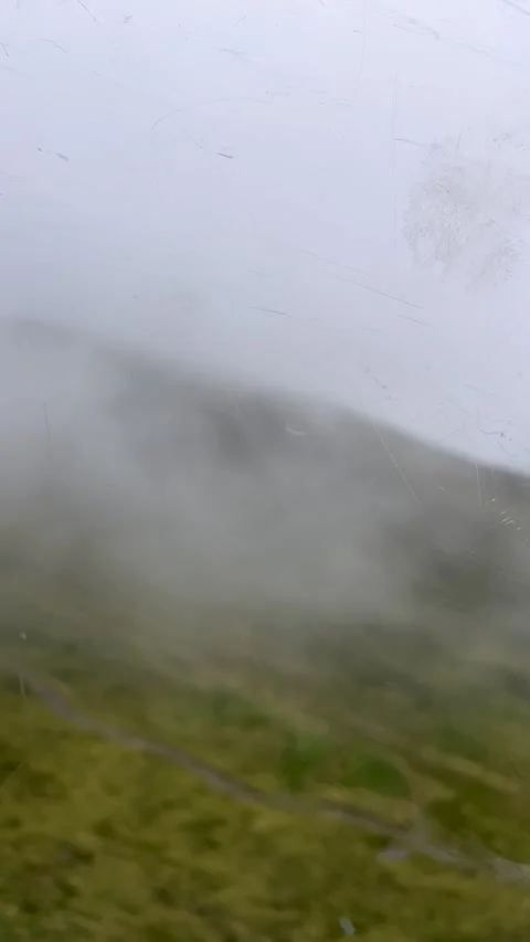A breathtaking Misty Mountain Landscape, adorned with captivating Cloud Coverage Stock Footage 292796500