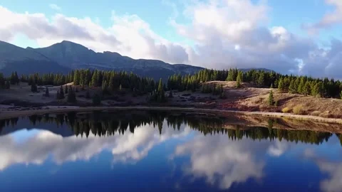 Breathtaking Mountain Lake Reflection at Sunset - Scenic Alpine Landscape Stock Footage 328933018