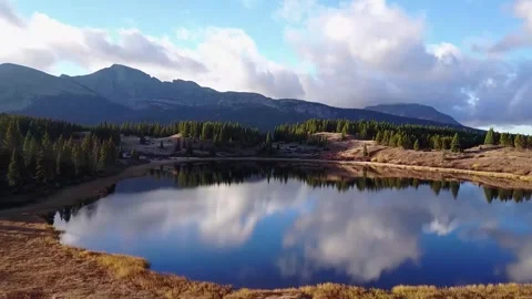 Breathtaking Mountain Lake Reflection at Sunset - Scenic Alpine Landscape Stock Footage 328933145