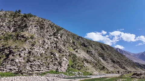Breathtaking Mountain Landscape Clear Blue Sky with Sunshine and Fluffy Whit Stock Footage 286332164
