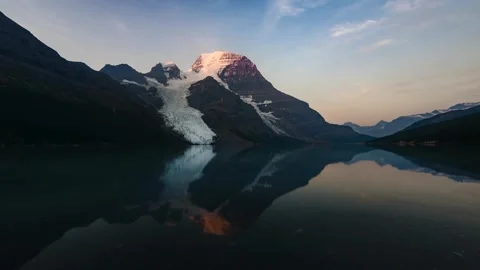 Breathtaking Mountain Reflection over Serene Lake at Dusk: A Stunning Landscape  Video stock 323259954