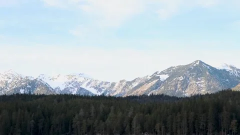 Breathtaking Mountain View With Snow-Capped Peaks and Serene Lake in the Stock Footage 301135274