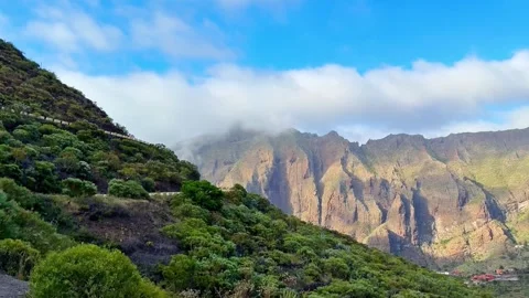 Breathtaking Mountain Views Surrounded by Lush Greenery offer an unforgettable Stock Footage 314974143