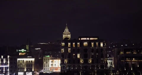 A breathtaking night video of Istanbul's Karaköy shoreline from the Bosphorus Stock Footage 296240153