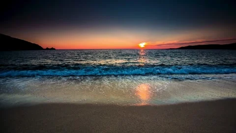 Breathtaking Ocean Sunset – Waves Reflecting Golden Light Stock Footage 301815204