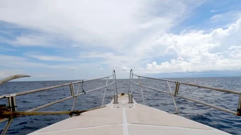 Breathtaking Ocean View from a Boat Under Blue Sky with Scattered Clouds Stock Footage 280221355