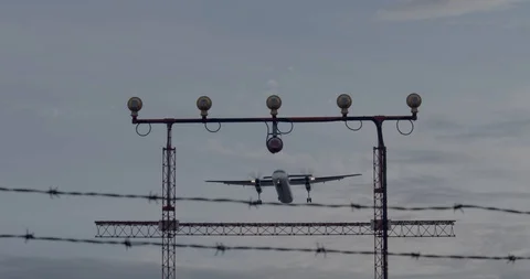 Breathtaking overhead shot of propeller plane landing Stock Footage 108061965