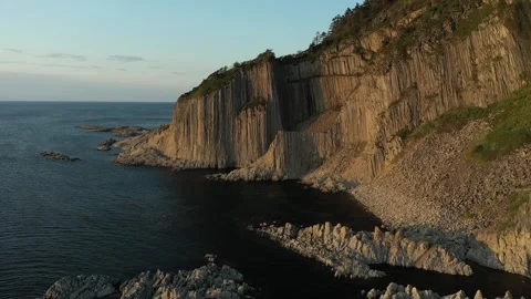 Breathtaking panoramic span over Cape Stolbchaty at sunset. Stock Footage 165170433