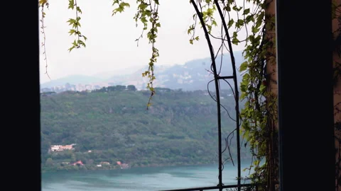 Breathtaking panoramic view of mountains and famous Albano lake through the Stock Footage 317577315