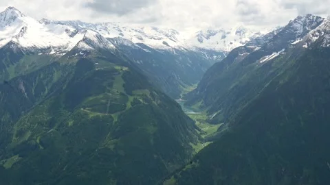 A breathtaking panoramic view of the snow-capped Austrian Alps, showcasing 스톡 동영상 281678393