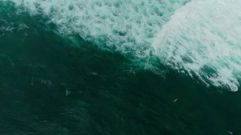 Breathtaking Peaceful Surfer Floating Ocean Lineup Uluwatu 4K Видео 341416563