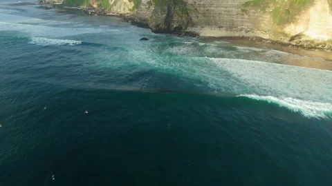 Breathtaking Peaceful Surfer Floating Ocean Lineup Uluwatu 4K Stockbeeldmateriaal 341478896