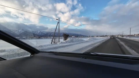 Breathtaking Rainbow Over Snowy Mountains POV Winter Drive Hokkaido Stock Footage 333698971