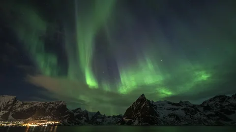 Breathtaking rays of Northern Lights over mountains Stock Footage 251343577