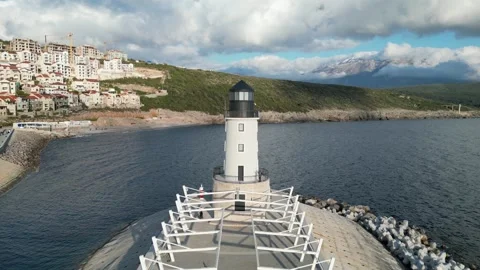 Breathtaking Scenic Lighthouse View Overlooking the Serene and Calm Waters of Stock Footage 300472263