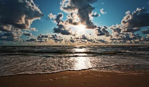Breathtaking seashore with the sunset Stock Photos